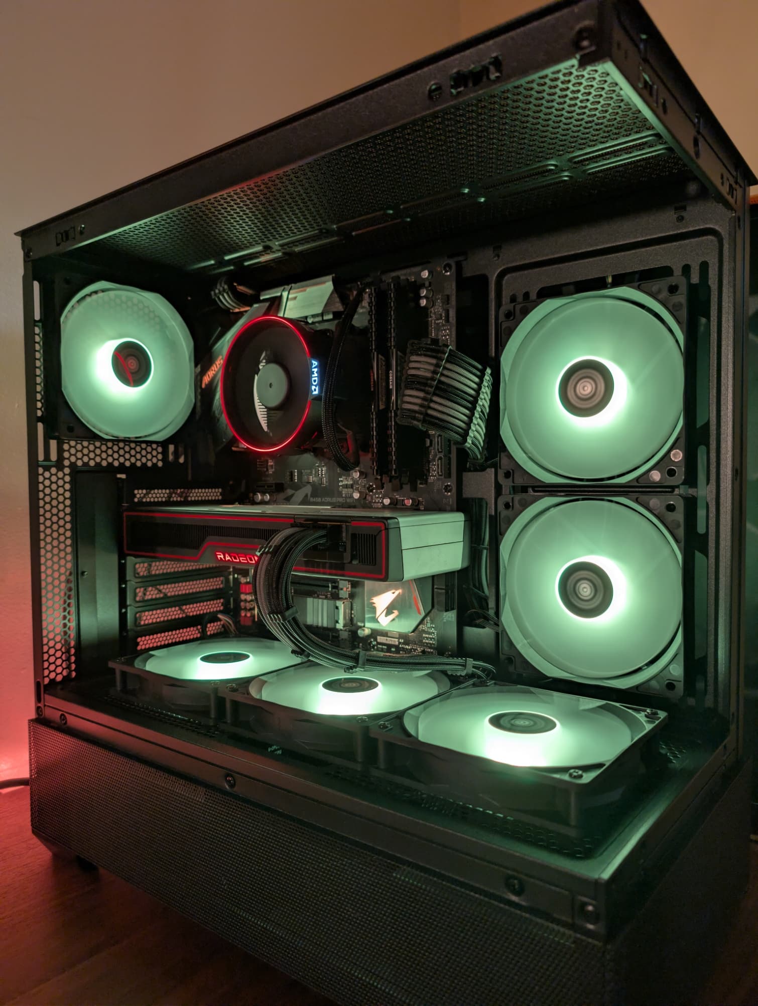 Front three-quarter view of the AM4 mid-tier build in the Sama V40 case