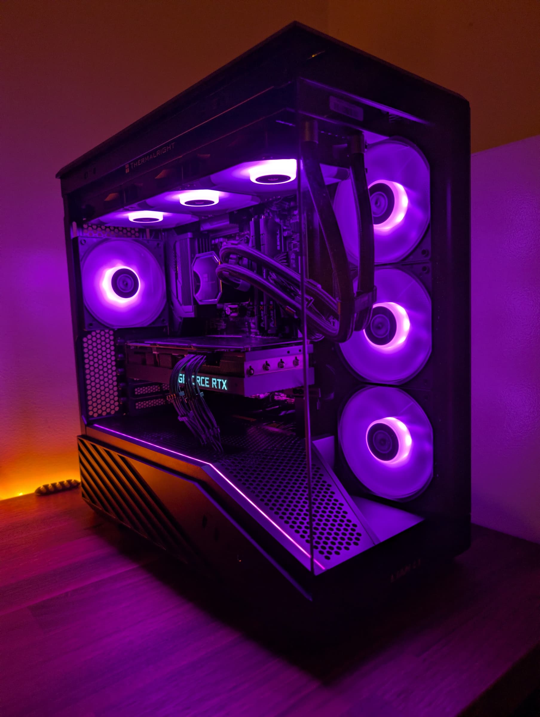 Front view of the AM5 high-performance gaming build in the Lian Li Vector V100R Mini